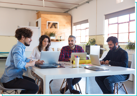 Team at Web Analyze Fix collaborating at a table